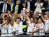Wayne Rooney and Michael Carrick lift the FA Cup trophy on May 21, 2016