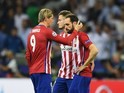 Fernando Torres consoles Juanfran after the Champions League final between Real Madrid and Atletico Madrid on May 28, 2016