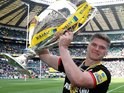 Owen Farrell majestically hoists the trophy aloft after the Aviva Premiership final between Saracens and Exeter Chiefs on May 28, 2016