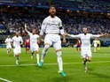 Sergio Ramos celebrates his opener during the Champions League final between Real Madrid and Atletico Madrid on May 28, 2016
