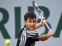 Dominic Thiem returns the ball to Marcel Granollers at the French Open on June 1, 2016