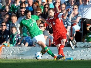 Republic of Ireland's Stephen Ward tries to tackle Belarus's Mikhail Hardzeichuk on May 31, 2016