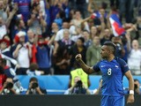 France's forward Dimitri Payet celebrates scoring France's second goal during the Euro 2016 group A football match between France and Romania at Stade de France, in Saint-Denis, north of Paris, on June 10, 2016