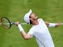 Andy Murray serves during his second-round match against Aljaz Bedene on day four of the Aegon Championships on June 16, 2016
