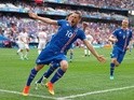 Gylfi Sigurdsson celebrates after scoring during the Euro 2016 Group F match between Iceland and Hungary on July 18, 2016