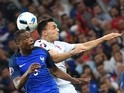 Patrice Evra and Taulant Xhaka in action during the Euro 2016 Group A game between France and Albania on June 15, 2016