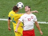 Ruslan Rotan and Grzegorz Krychowiak in action during the Euro 2016 Group C match between Ukraine and Poland on June 21, 2016