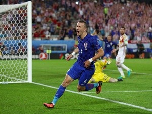 Ivan Perisic celebrates scoring his team's second goal during the Euro 2016 Group D match between Croatia and Spain on June 21, 2016