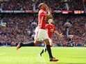 Anthony Martial celebrates scoring during the Premier League game between Manchester United and Stoke City on October 2, 2016