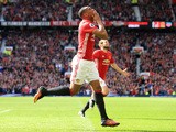Anthony Martial celebrates scoring during the Premier League game between Manchester United and Stoke City on October 2, 2016