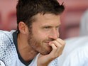 Manchester United midfielder Michael Carrick sits on the bench during his side's Premier League clash with Bournemouth on August 14, 2016