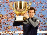 Andy Murray holds up his champion trophy at the China Open tennis tournament in Beijing on October 9, 2016