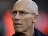 Swansea City manager Bob Bradley watches on from the touchline during his side's Premier League clash with Manchester United at the Liberty Stadium on November 6, 2016