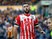 Southampton striker Charlie Austin in action during his side's Premier League clash with Hull City at the KCOM Stadium on November 6, 2016