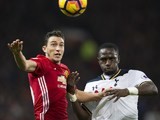 Matteo Darmian and Moussa Sissoko in action during the Premier League game between Manchester United and Tottenham Hotspur on December 11, 2016