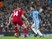 David Silva goes up against Jordan Henderson during the Premier League game between Liverpool and Manchester City on December 31, 2016