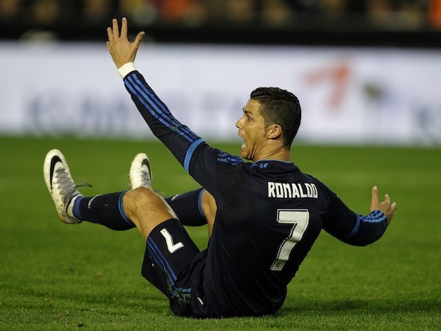 Cristiano Ronaldo takes a tumble during the game between Valencia and Real Madrid on January 3, 2016