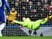 Thibaut Courtois pulls off a fingertip save during the Premier League game between Chelsea and Arsenal on February 4, 2017