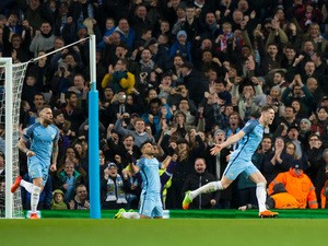 Manchester City defender John Stones celebrates after scoring during the Champions League last 16 first leg against AS Monaco at the Etihad Stadium on February 21, 2017