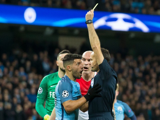A flabbergasted Sergio Aguero is booked for diving during the Champions League last 16 first leg between Manchester City and AS Monaco at the Etihad Stadium on February 21, 2017