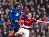 Marouane Fellaini and Marten de Roon in action during the Premier League game between Middlesbrough and Manchester United on March 19, 2017