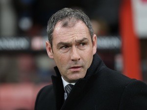 Paul Clement watches on during the Premier League game between Bournemouth and Swansea City on March 18, 2017