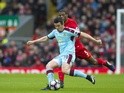 Joey Barton and Georginio Wijnaldum during the Premier League match between Burnley and Liverpool on March 12, 2017