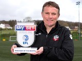 Bolton boss Phil Parkinson poses with his League One manager of the month award for March 2017