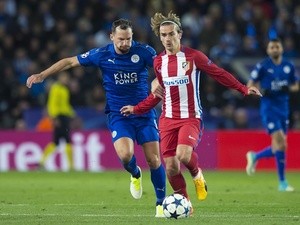 Leicester City's Danny Drinkwater and Atletico Madrid's Antoine Griezmann in action during the Champions League match on April 18, 2017