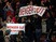 Arsenal fans hold up 'Wenger Out' signs during the Premier League clash with Middlesbrough at the Riverside Stadium on April 17, 2017