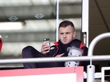 Jack Wilshere sits with his leg in a protective brace ahead of the Premier League game between Bournemouth and Stoke City on May 6, 2017