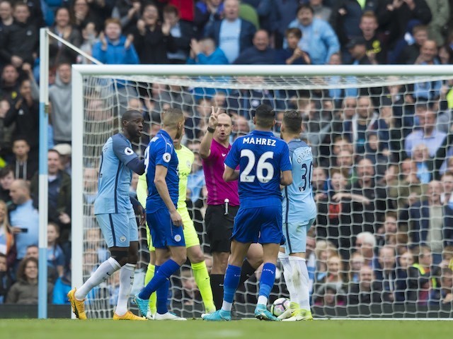 Riyad Mahrez has a penalty disallowed during the Premier League game between Manchester City and Leicester City on May 13, 2017