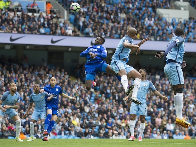 Wilfred Ndidi misses a header during the Premier League game between Manchester City and Leicester City on May 13, 2017