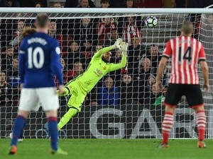 Manchester United's Sergio Romero saves from Southampton's James Ward-Prowse during the Premier League match on May 17, 2017