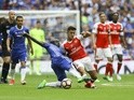 N'Golo Kante tackles Alexis Sanchez during the FA Cup final between Arsenal and Chelsea on May 27, 2017
