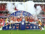 Blackpool players celebrate promotion to League One on May 28, 2017
