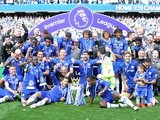 The Chelsea squad celebrate with the trophy during the Premier League game between Chelsea and Sunderland on May 21, 2017