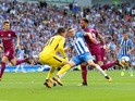 Ederson, Jamie Murphy and Kyle Walker in action during the Premier League game between Brighton & Hove Albion and Manchester City on August 12, 2017