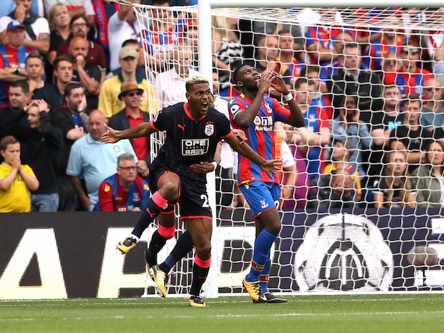Steve Mounie celebrates scoring during the Premier League game between Crystal Palace and Huddersfield Town on August 12, 2017