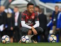 Alexis Sanchez squats ahead of the Premier League game between Chelsea and Arsenal on September 17, 2017
