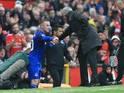 Jose Mourinho shakes Wayne Rooney's hand during the Premier League game between Manchester United and Everton on September 17, 2017